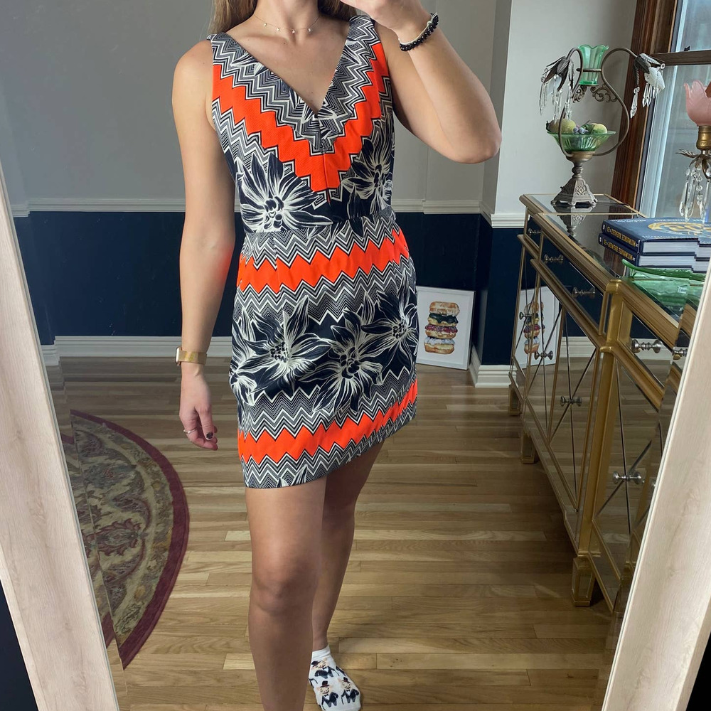 Milly V-Neck Mini Dress in Black, White & Orange Zigzag Floral Print